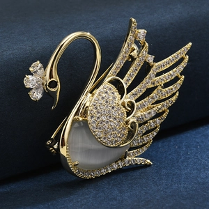 Exquisite golden swan brooch with pavé micro zircons and cat-eye stone for suits