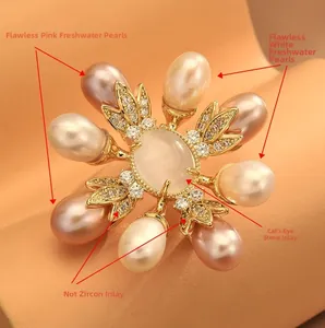 Detailed close-up of 18K gold brooch featuring pink freshwater pearls and opal stone