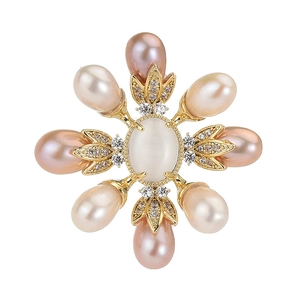 Elegant floral brooch with pink freshwater pearls and zircon accents on golden base