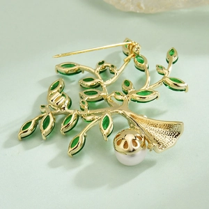Elegant gold money tree brooch with green marquise crystals and a white pearl accent