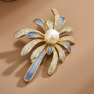 Elegant floral enamel brooch with white pearl and blue gradient petals in gold finish
