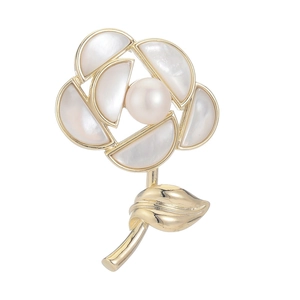 Elegant rose brooch with white mother of pearl petals and a freshwater pearl center