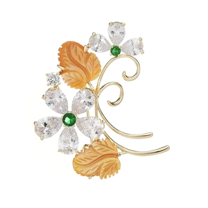 Elegant vintage gold floral brooch with sparkling clear zircons and green gemstones
