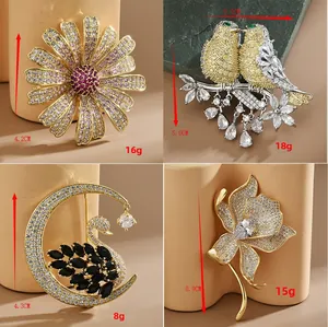 Detailed size and weight specs for bird, swan, daisy and lily cubic zirconia brooches