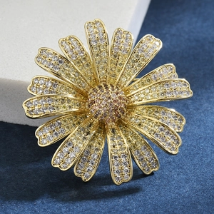 Detail of micro-set zircon daisy brooch with gold plating and multi-layered petals