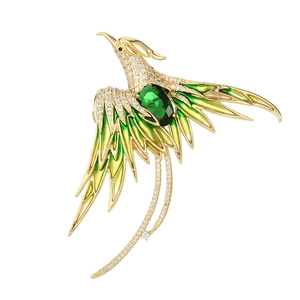 Elegant gold-plated phoenix brooch with green enamel gradient and sparkling cubic zirconia