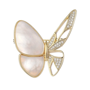 Elegant butterfly brooch with white mother-of-pearl and crystal pavé on a golden frame