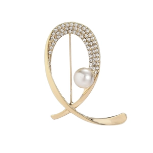 Elegant gold letter Q brooch with sparkling rhinestones and a white pearl accent