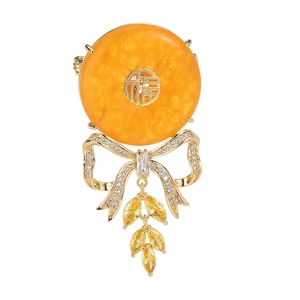 Elegant bow brooch with Chinese Fu character, amber stone and micro-set zircon accents