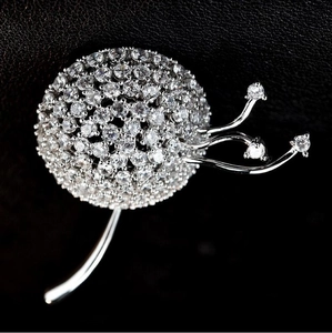 Elegant dandelion brooch pin with silver base and sparkling cubic zirconia stones