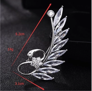 Detailed view of swan brooch dimensions 5.2cm x 3.1cm with sparkling marquise zircons