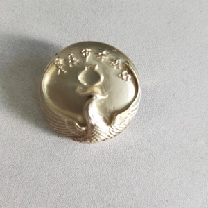 Vintage golden phoenix brooch with embossed details and elegant matte metallic finish