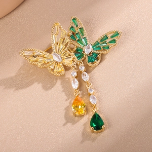 Exquisite double butterfly brooch with amber and green crystals and dangling tassels