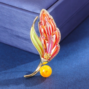 Elegant gold leaf brooch with colorful enamel, white zircons and yellow amber bead