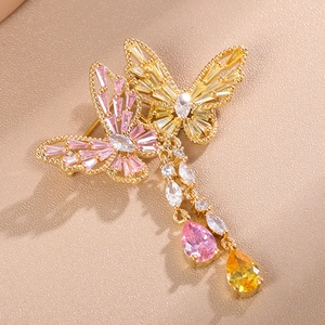 Exquisite gold-plated butterfly brooch with colorful crystals and long tassel pendants
