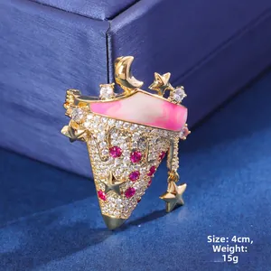 Detailed view of 4cm pink enamel ice cream cone brooch with pink crystals and stars