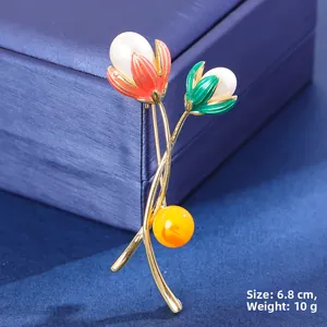 Detail of tulip brooch with pearls, size 6.8cm and 10g weight for elegant accessories