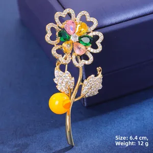 Exquisite sunflower brooch with colored zircon petals and amber bead, length 6.4cm, weight 12g