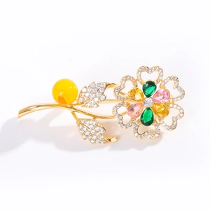 Elegant sunflower brooch featuring amber bead, colorful gemstones, and zircon accents