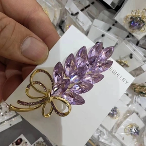 Elegant purple crystal wheat brooch with golden ribbon design for women's sweaters