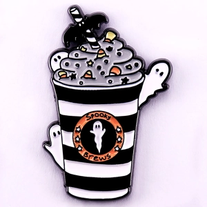 Detail of Halloween enamel pin featuring Spooky Brews cup with ghosts and bat straw