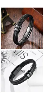 Detail of men's black braided leather bracelet with magnetic metal clasp and twin ring decor