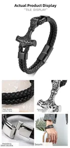Detailed close-up of woven black leather cord and stainless steel Mjölnir pendant