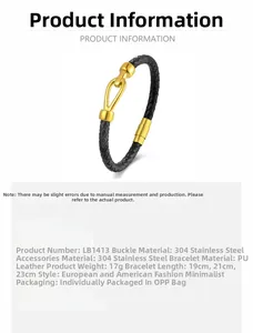 Detail of black braided leather bracelet with golden stainless steel horseshoe magnetic clasp