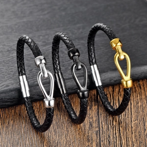 Braided leather bracelets for men with horseshoe magnetic clasps in silver, gold, and black