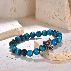 Men's tiger eye beaded bracelet with vintage steel wolf head on mineral stones