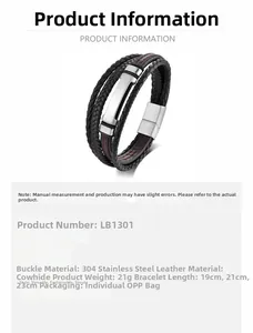 Détail d'un bracelet en cuir noir tressé avec coutures rouges et fermoir magnétique