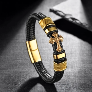 Men's woven black leather bracelet featuring a vintage golden cross and magnetic buckle