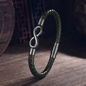 Bracelet pour homme en cuir tressé noir avec symbole infini et fermoir magnétique en métal