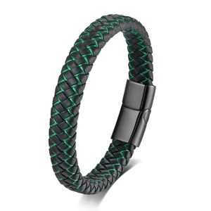 Detailed close-up of woven black leather bracelet featuring emerald green silk stitching