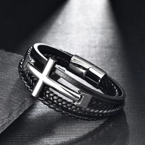 Men's braided leather bracelet featuring a polished stainless steel cross charm