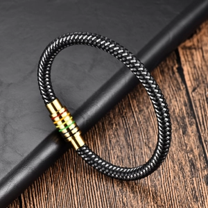 Detailed close-up of a braided leather men's bracelet with a colorful magnetic clasp