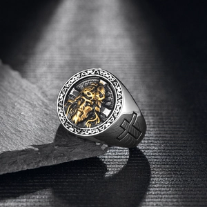 Vintage steel signet ring for men featuring golden Jesus portrait and cross engraving