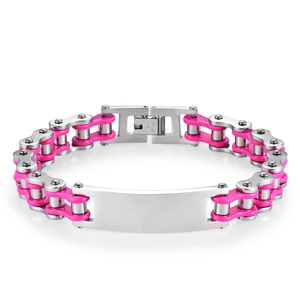 Detail of bike chain style stainless steel bracelet with engravable plate and pink accents