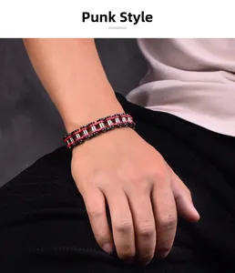Detailed macro view of a red and black punk bike chain bracelet for men