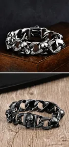 Detail of punk skull link bracelet in silver and vintage black stainless steel finish