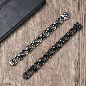 Punk style men's titanium steel skull bracelets in silver and matte black finish