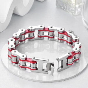 Detailed close-up of red and silver bicycle chain style bracelet with a metal buckle