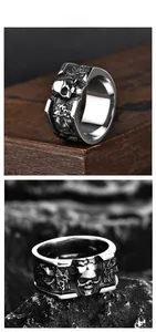 Detail of vintage punk square skull ring with 3D embossed rose relief patterns