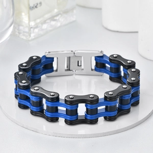 Close-up of blue and black industrial bike chain bracelet with stainless steel buckle