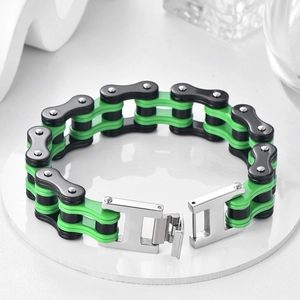 Macro shot of green and black bicycle chain style stainless steel bracelet with buckle