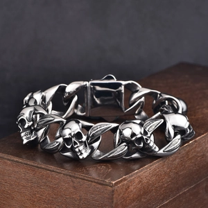 Punk style stainless steel skull bracelet with wing pattern and heavy curb chain