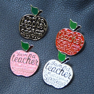 Colorful apple enamel lapel pins in four colors with inspirational teacher quotes