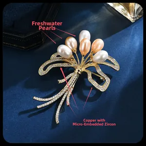 Macro shot of freshwater pearls and micro-set cubic zirconia on a bouquet brooch