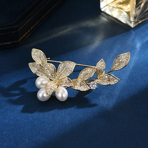 Elegant morning glory golden brooch with freshwater pearls and sparkling crystals