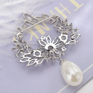 Elegant zircon pearl flower brooch with silver marquise stones and drop pearl pendant